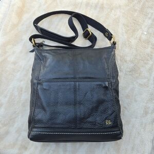 The Sak Black Pebbled Leather Crossbody with Brass Zipper Accent